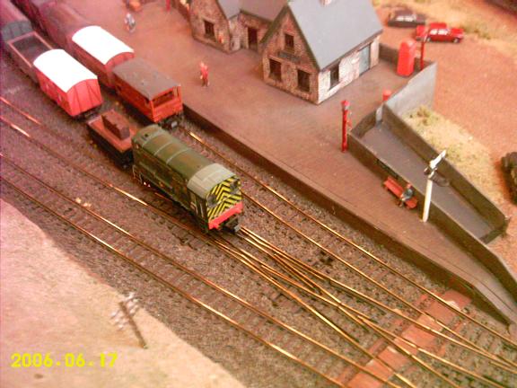 A green class 08 shunts on Blackdale.