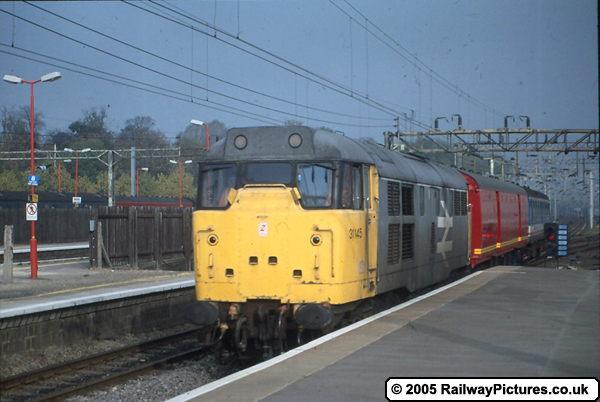 31145 pulling a mail train.