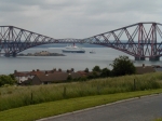 QE2 framed by the Forth Bridge